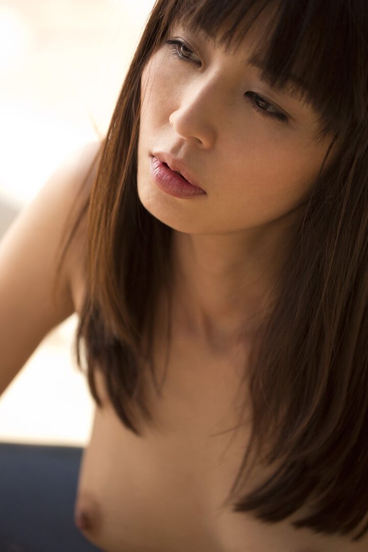 15P Beautiful Asian model Marica Hase strikes great poses while removing lingerie