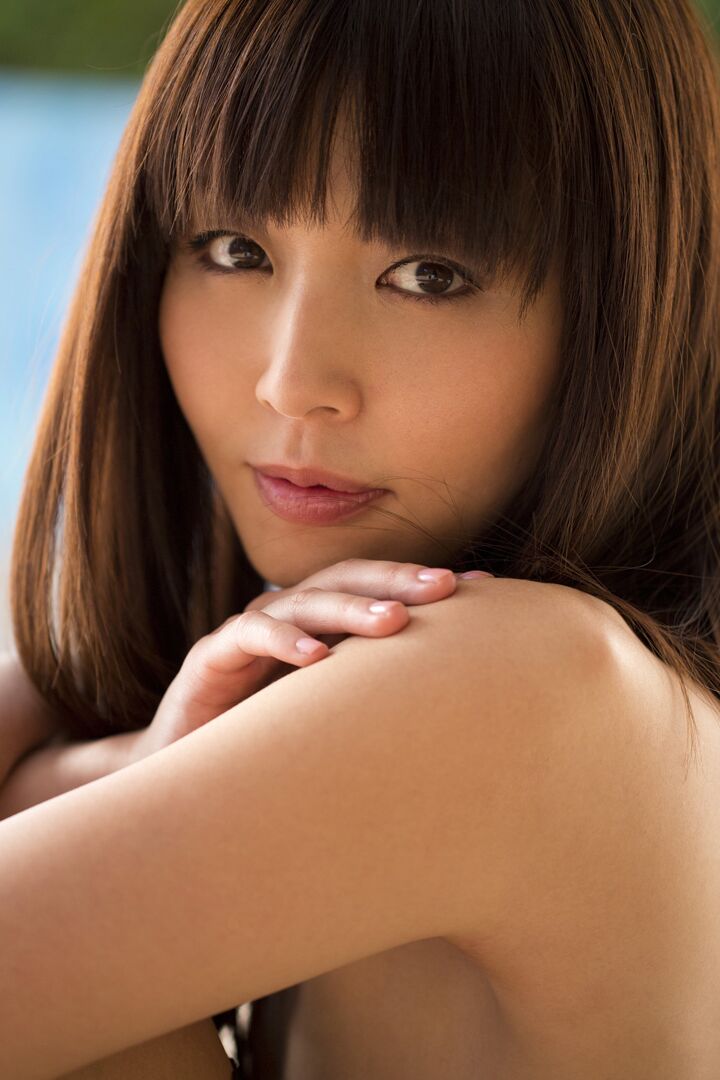 15P Beautiful Asian model Marica Hase strikes great poses while removing lingerie