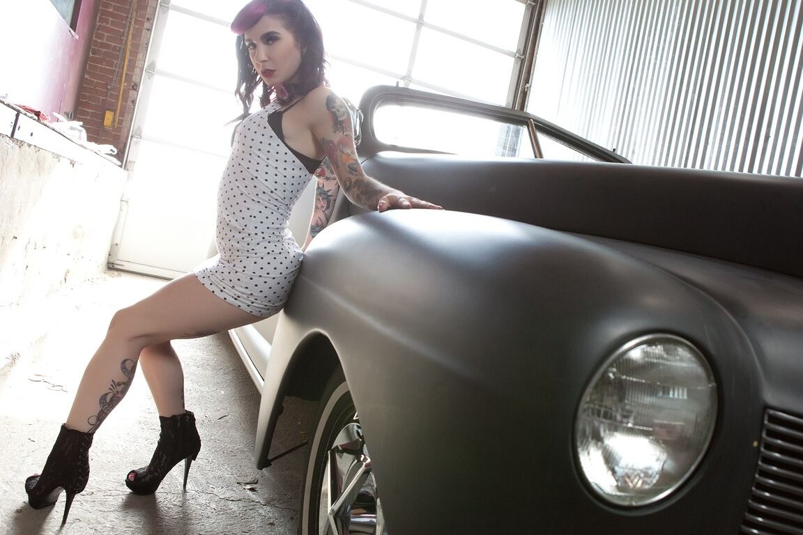 17P Sexy retro pinup Joanna Angel sheds her threads to pose nude in a vintage car