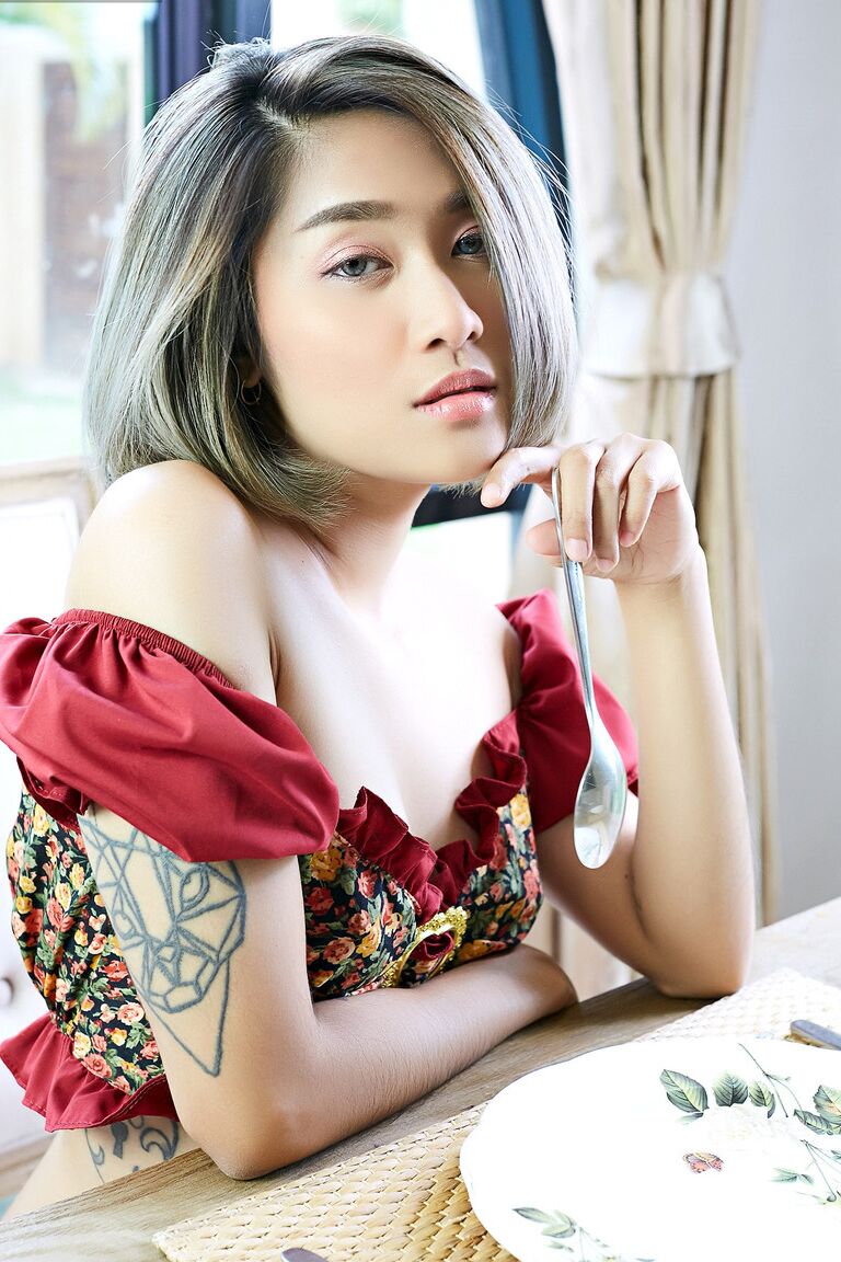 16P Asian solo girl Apple rubs her bush on a table after going topless