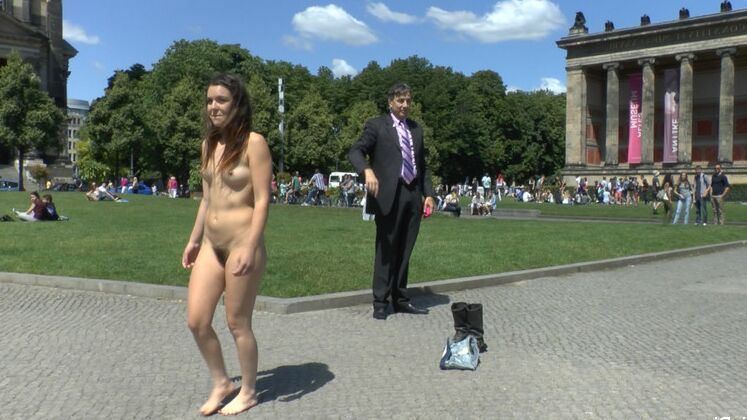 15P Caucasian girl strolls naked through a square before having sex in public