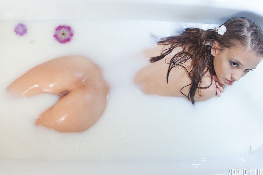 18P This mind blowing teen babe loves taking a nice and warm milky bath while