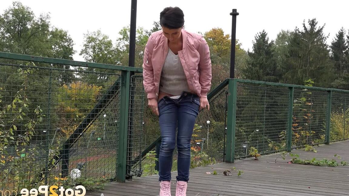 15P Short haired female Gabriellla Gucci squats foe a peen on a public crossover
