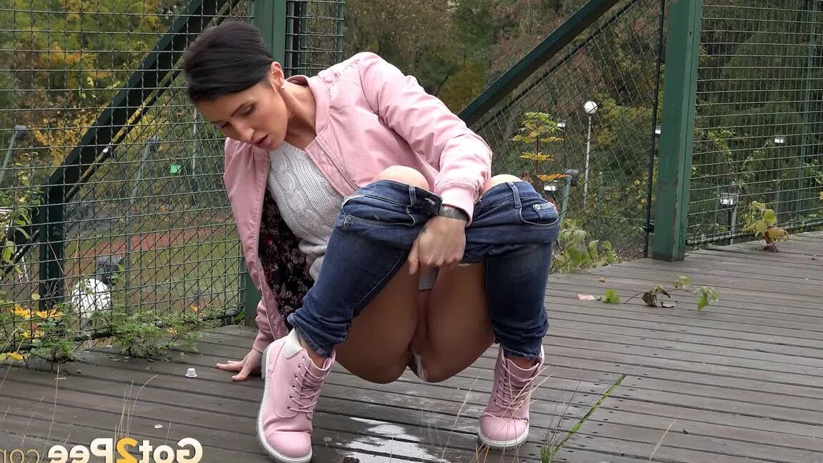 15P Short haired female Gabriellla Gucci squats foe a peen on a public crossover