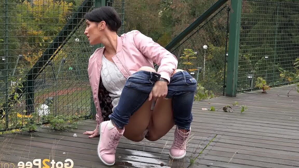 15P Short haired female Gabriellla Gucci squats foe a peen on a public crossover