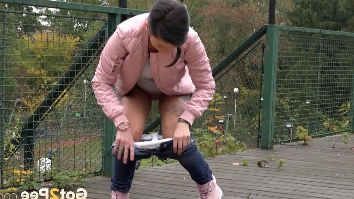 15P Short haired female Gabriellla Gucci squats foe a peen on a public crossover