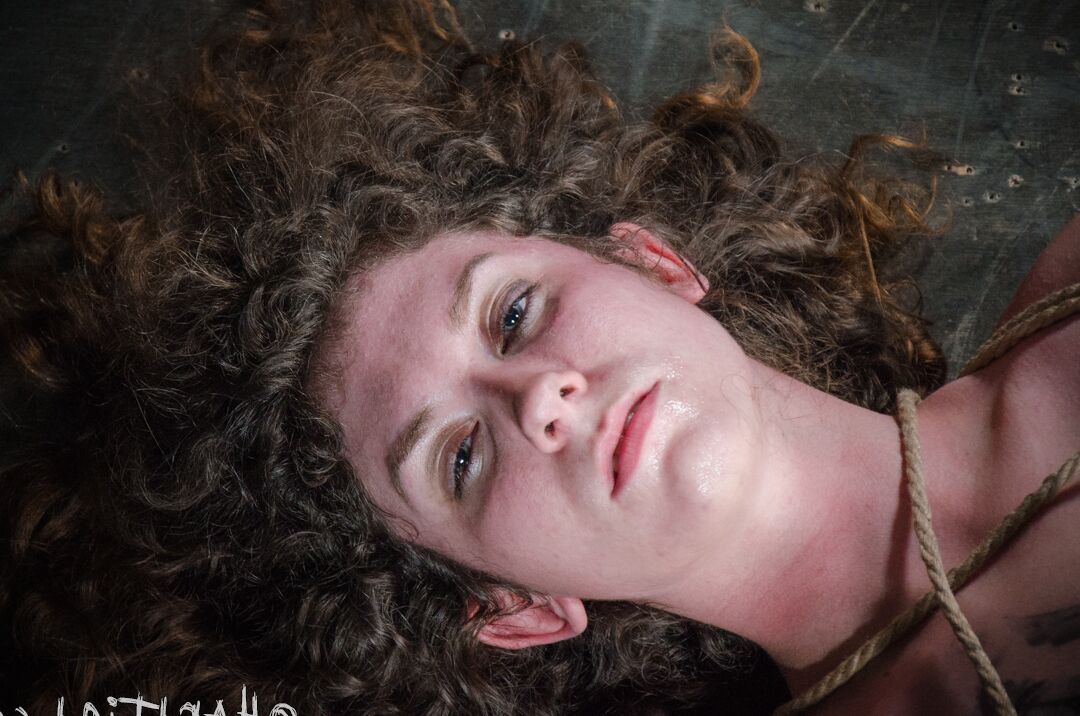 14P Big titted girl Samsara lets out a yelp while tied with rope to wooden rods