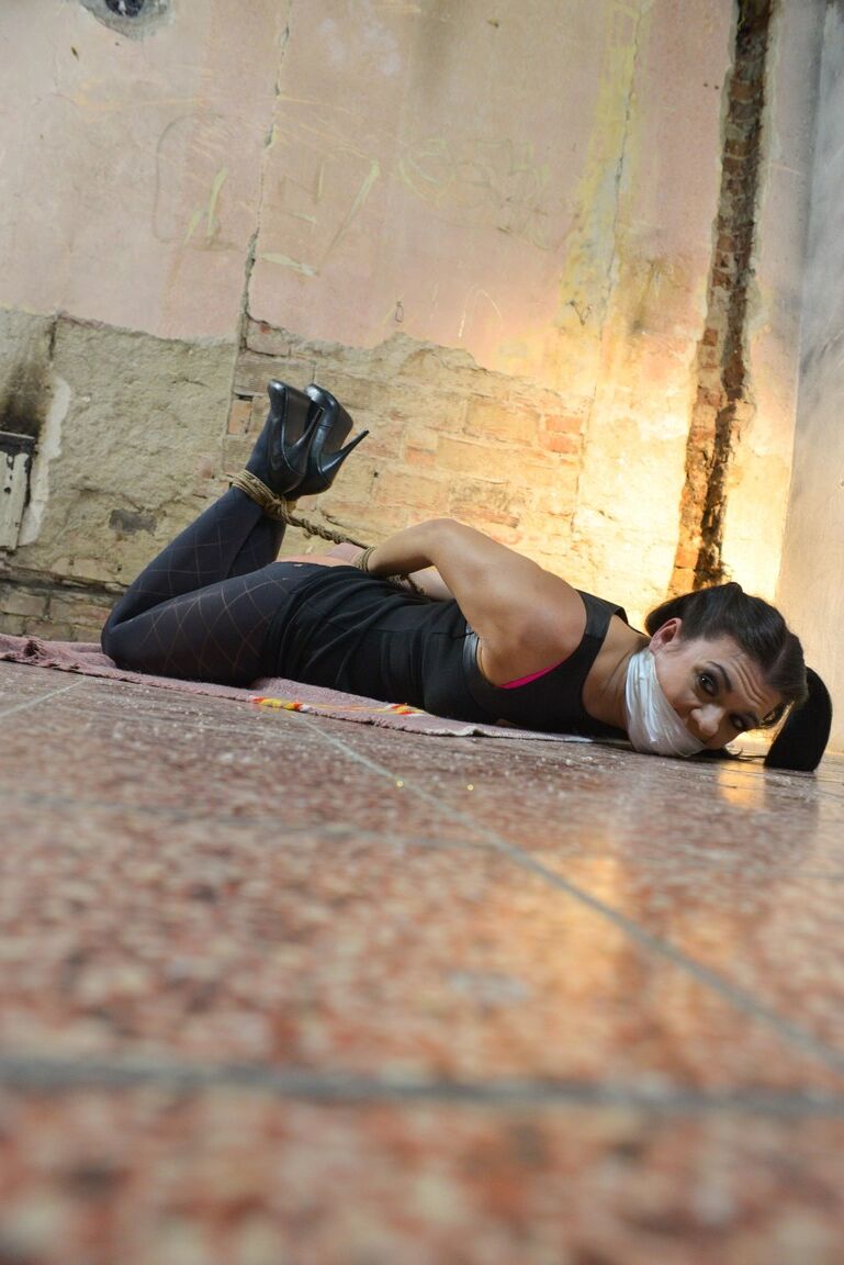 17P Dark haired chick with hair in pigtails gets gagged and hogtied