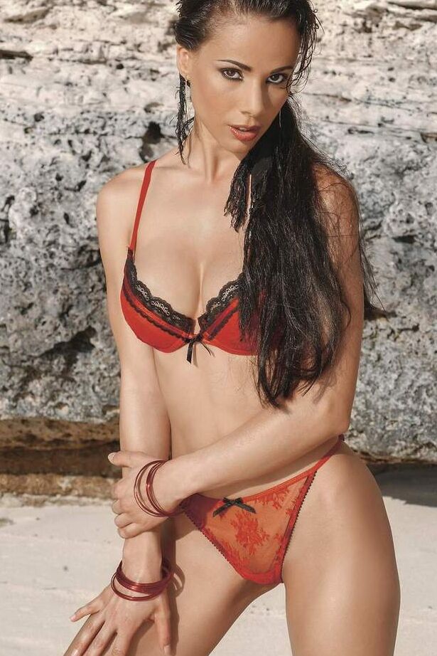 13P Hot chick with firm breasts gets naked on a towel on the beach