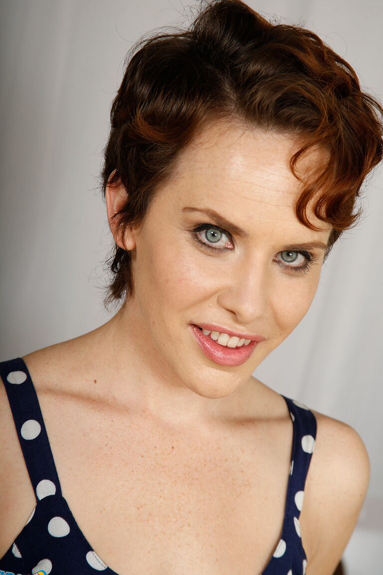 16P Short haired woman Katie St Ives strips and lubes up before a POV handjob