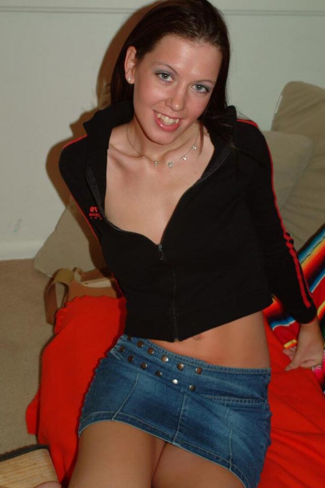 16P Amateur model Alicia works free of denim miniskirt to pose in the nude