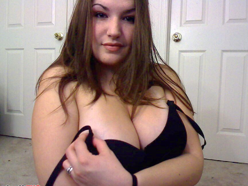 12P Kaylas huge double D tits are popping out of her tight black bra