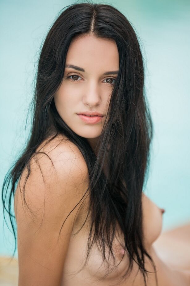 16P Dark haired amateur Sasha slips off her black bikini to pose for Playboy