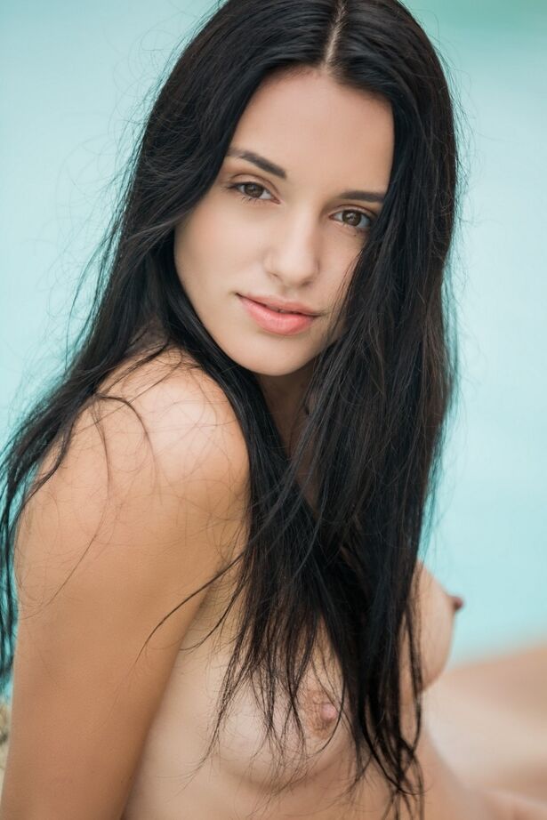 16P Dark haired amateur Sasha slips off her black bikini to pose for Playboy