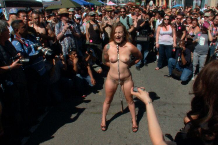 11P Caucasian girl is stripped naked on a crowded street before being gangbanged