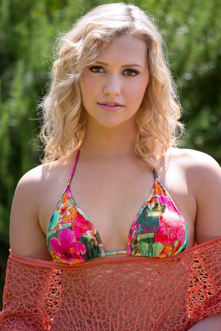 15P Beautiful blonde Mia Malkova goes topless on a sofa while in a backyard