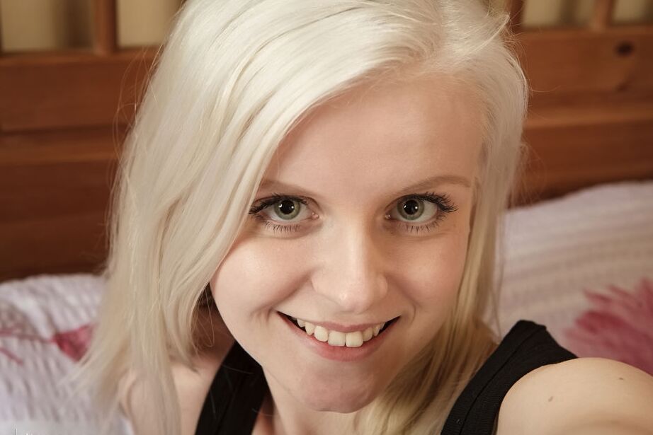 16P Blonde teen Andralin take selfies while showcasing her tight slip on a bed