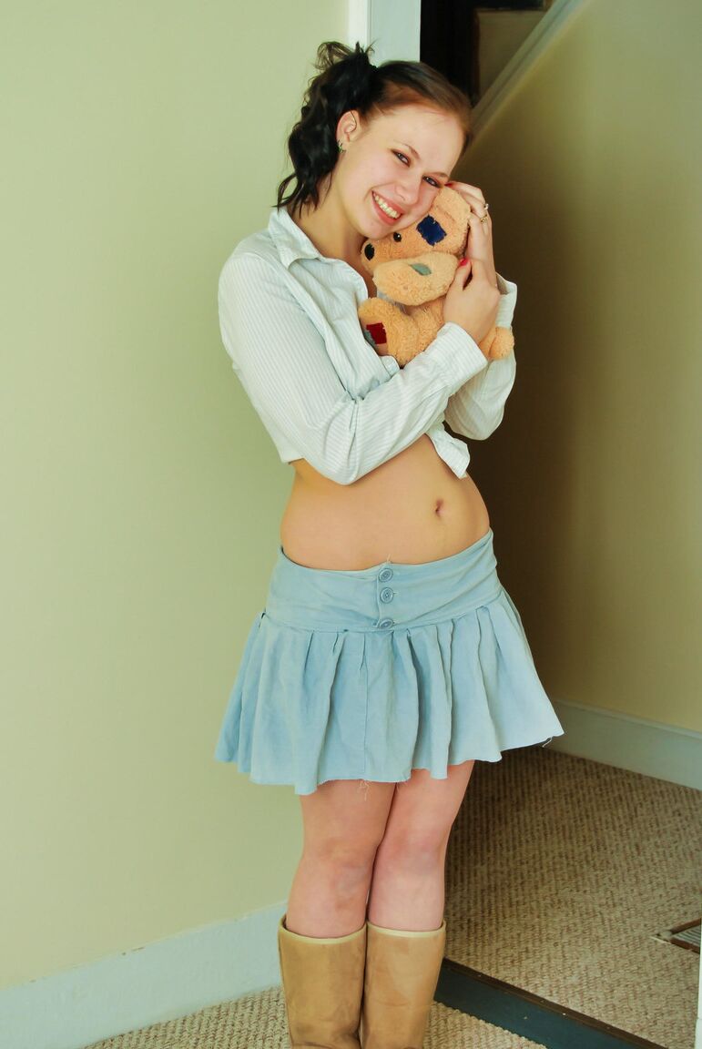 12P Amateur girl Emily exposes her tits and twat while holding a teddy bear