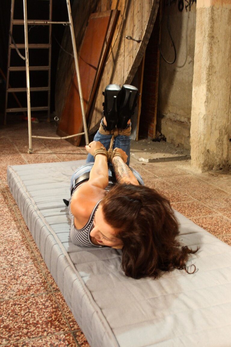 17P Distressed captive Adel hog tied & gagged fully clothed & helpless in basement