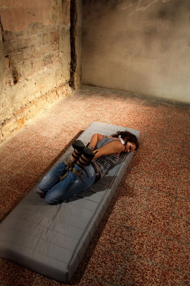 17P Distressed captive Adel hog tied & gagged fully clothed & helpless in basement
