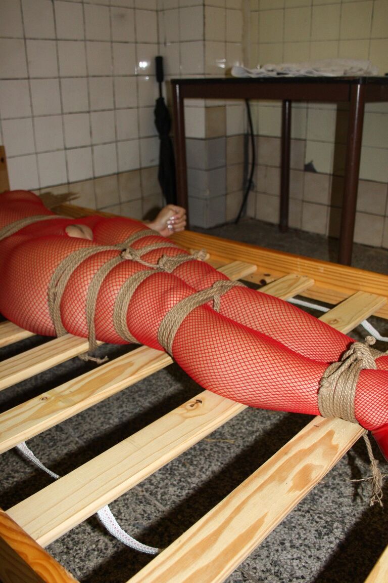 17P Czech MILF Cindy Dollar fishnet rope tied & gagged on a slatted bed frame