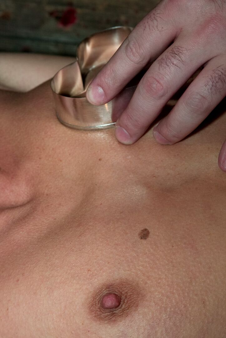 17P A gagged and restrained Cecilia Vegais is covered in heart shaped wax