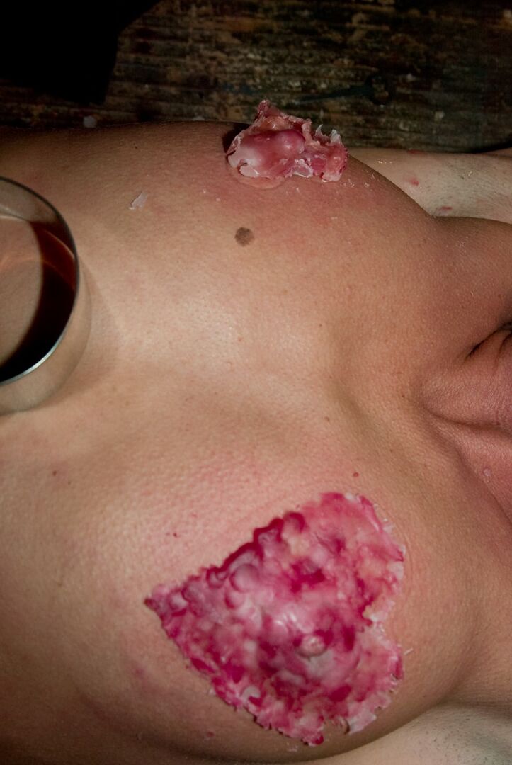 17P A gagged and restrained Cecilia Vegais is covered in heart shaped wax