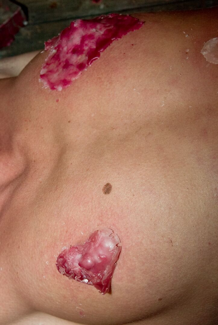 17P A gagged and restrained Cecilia Vegais is covered in heart shaped wax