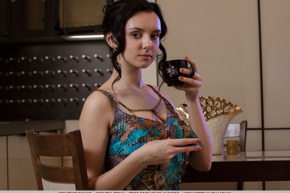 18P Shy babe Anatali shows her pink coochie while drinking a tea in the kitchen