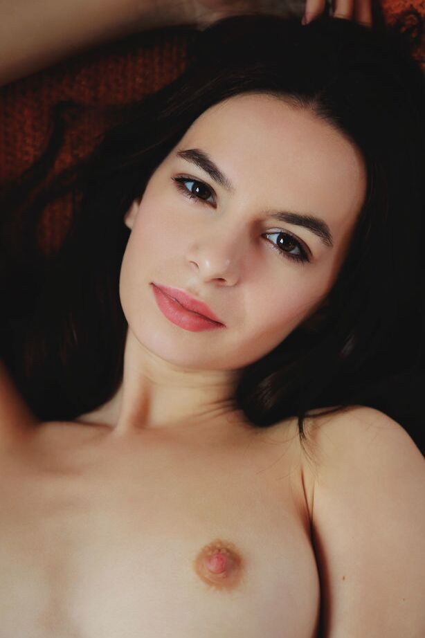 18P Dark haired teen Debora A shows her exquisite body after reading a book