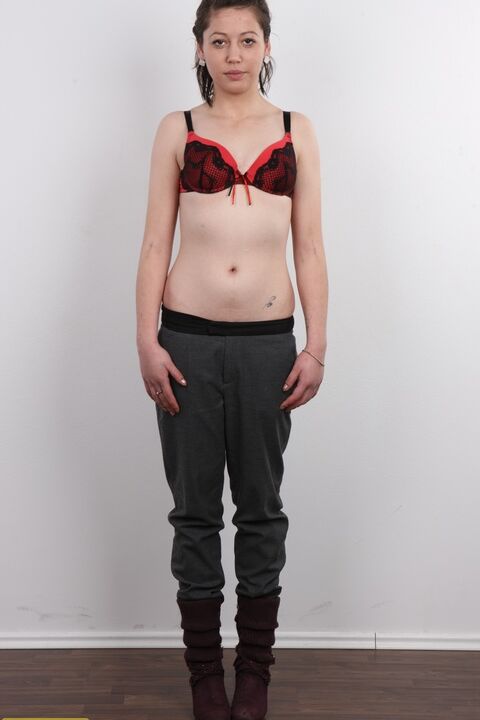20P Amateur girl Michala sits on a stool after divesting herself of clothes
