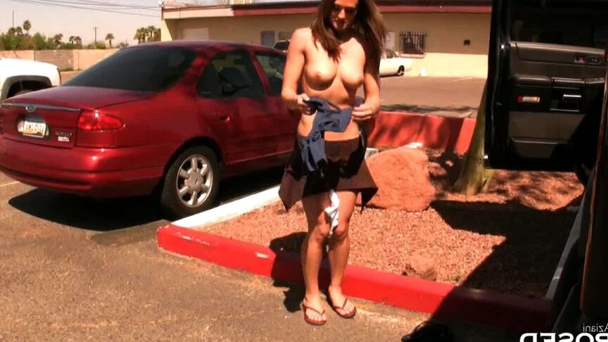 15P Female exhibitionist Misty Anderson gets naked while changing in a parking lot
