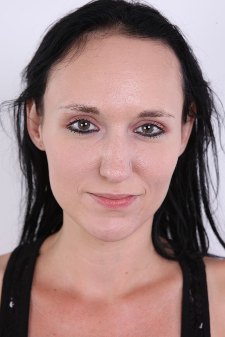 20P Dark haired girl Marcela takes a seat on a stool after getting totally naked