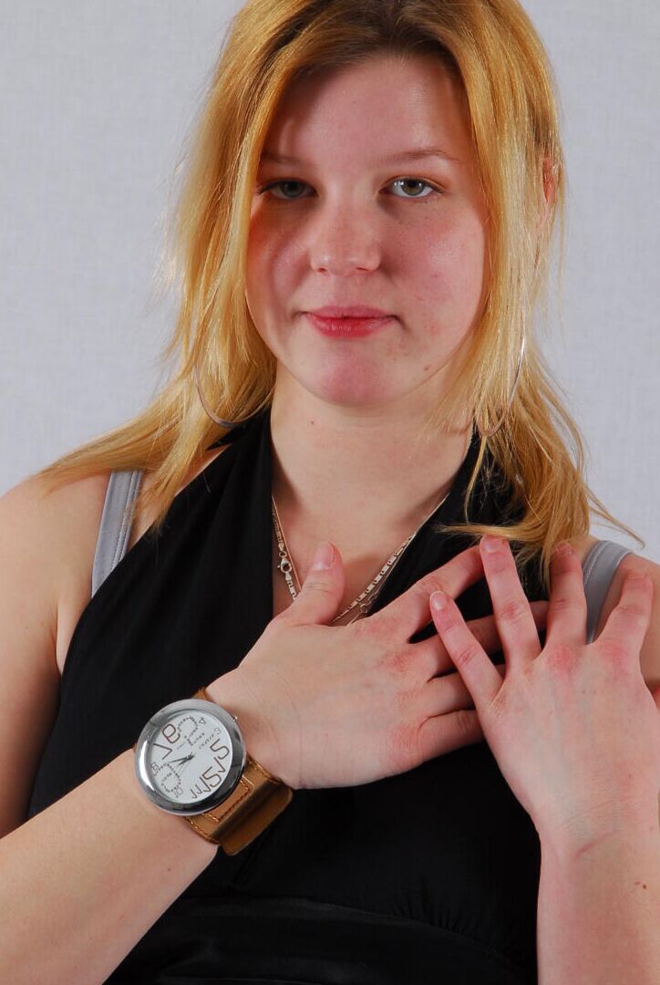 16P Kylie wearing her own Geneva huge cuff watch