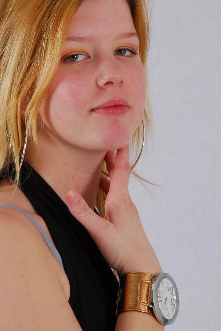 16P Kylie wearing her own Geneva huge cuff watch