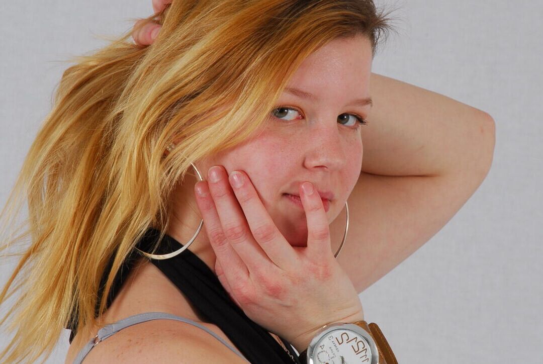 16P Kylie wearing her own Geneva huge cuff watch