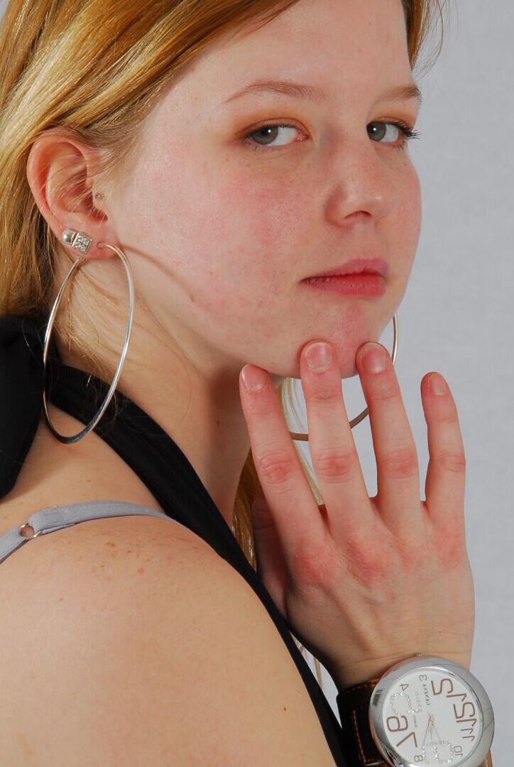 16P Kylie wearing her own Geneva huge cuff watch