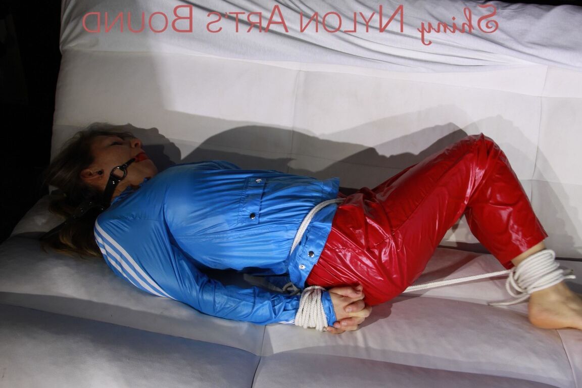 16P SEXY SANDRA being tied and gagged with ropes and a ballgag on a sofa wearing a