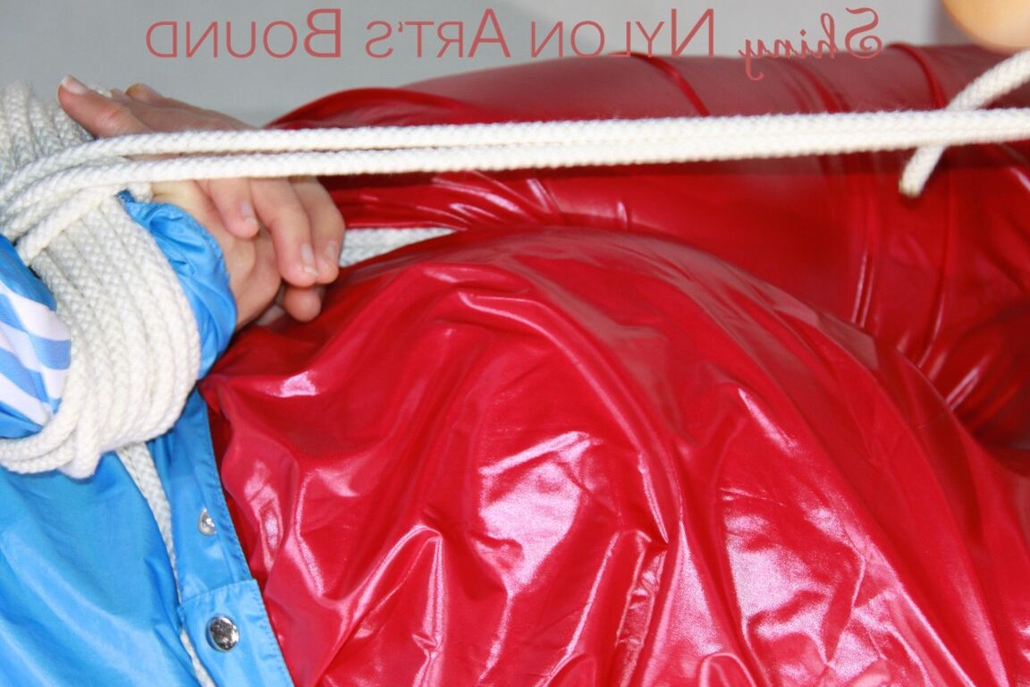 16P SEXY SANDRA being tied and gagged with ropes and a ballgag on a sofa wearing a
