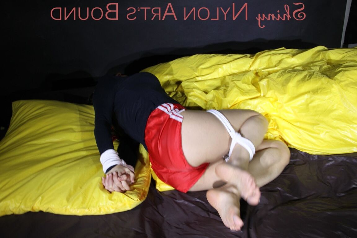 16P Sexy Sandra being tied and gagged feet on the hands with ropes and a clothgag