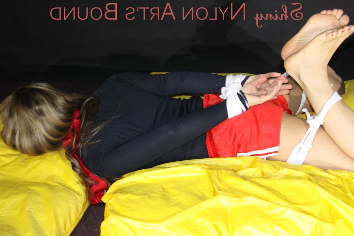 16P Sexy Sandra being tied and gagged feet on the hands with ropes and a clothgag