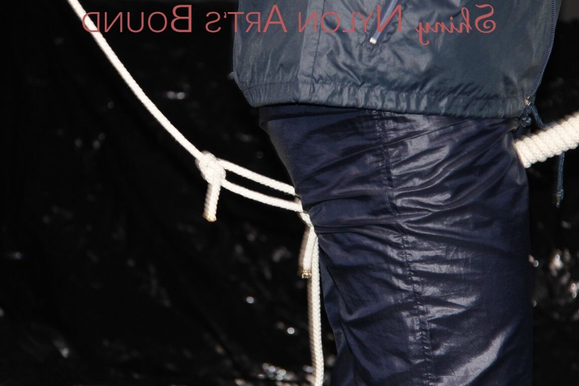 16P Sexy Sandra being tied and gagged overhead with ropes and a ballgag wearing a