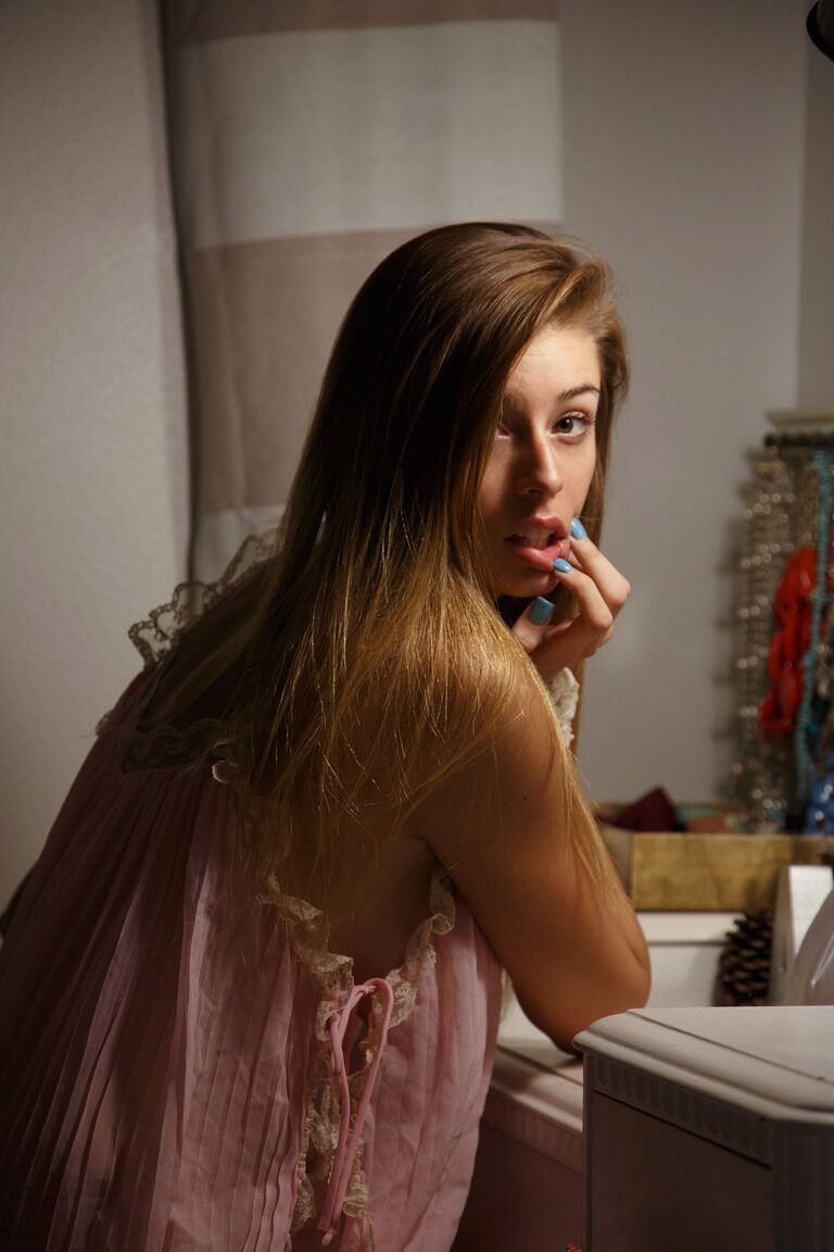 12P Beautiful amateur ginger Gracie Thibble posing topless by the Xmas tree