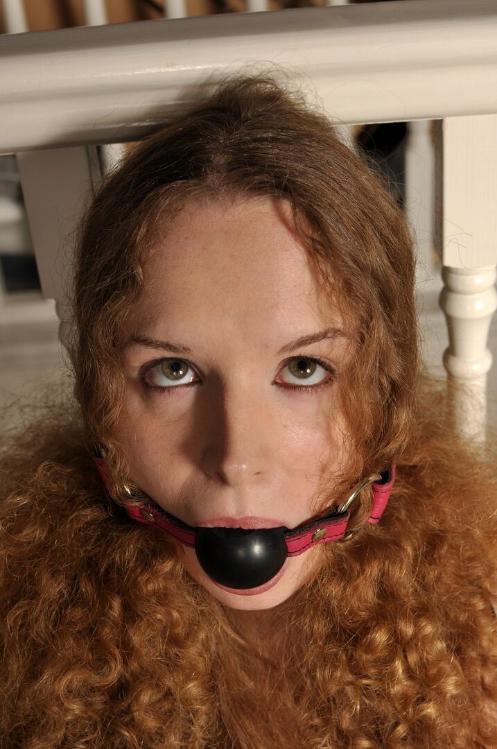 12P Redhead wearing a bodystocking tied up