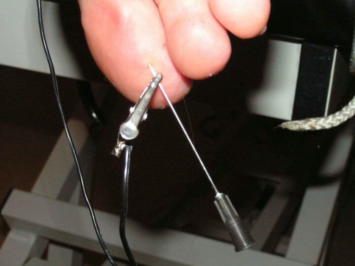 12P Restrained white girl has needles inserted into various body parts