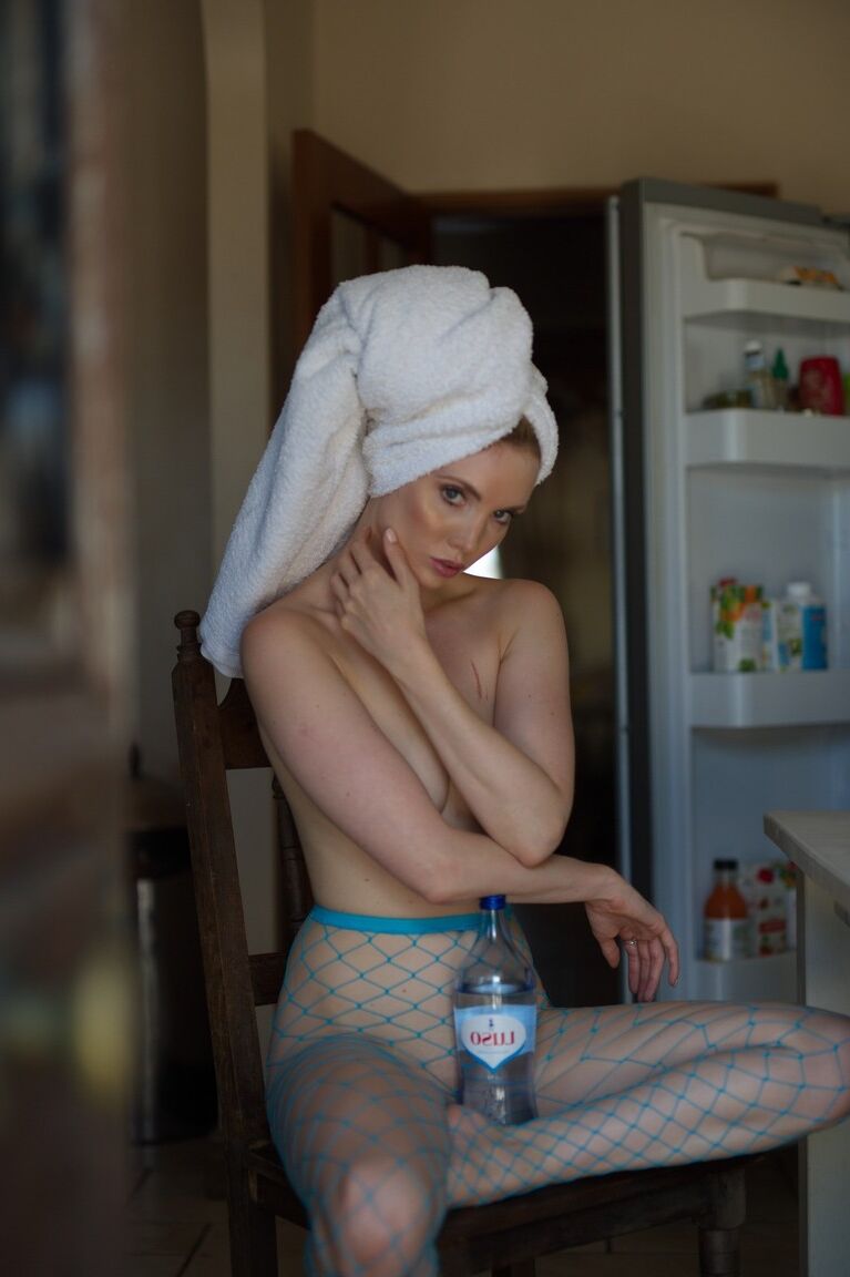 12P Glamour model Anuska poses topless in mesh hose with her hair in a towel