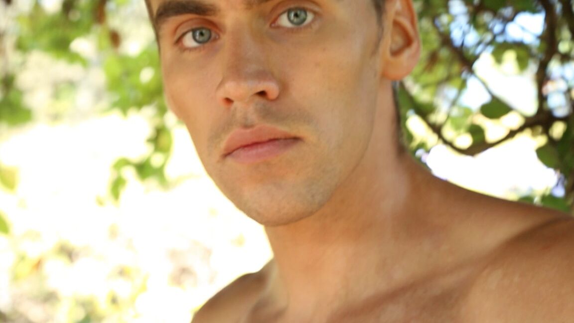 21P Handsome hunk Carter removes his undies and masturbates on the sofa