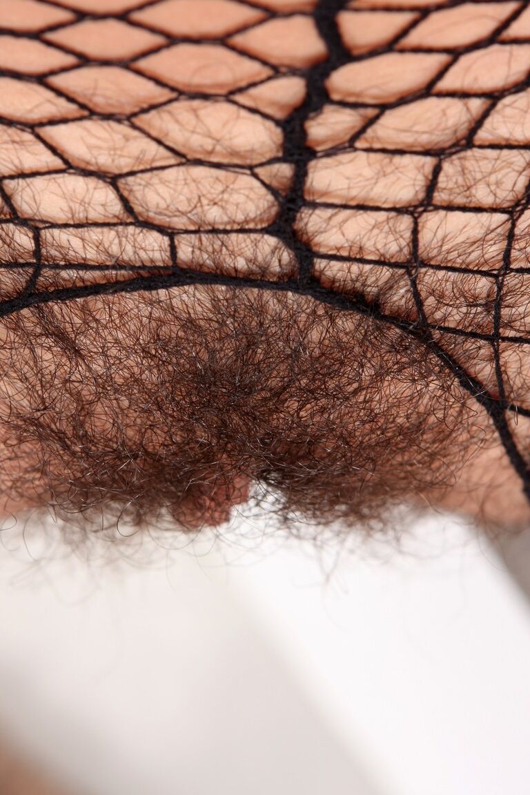 17P Redhead Czech with natural tits Ansie shows hairy twat through body fishnet