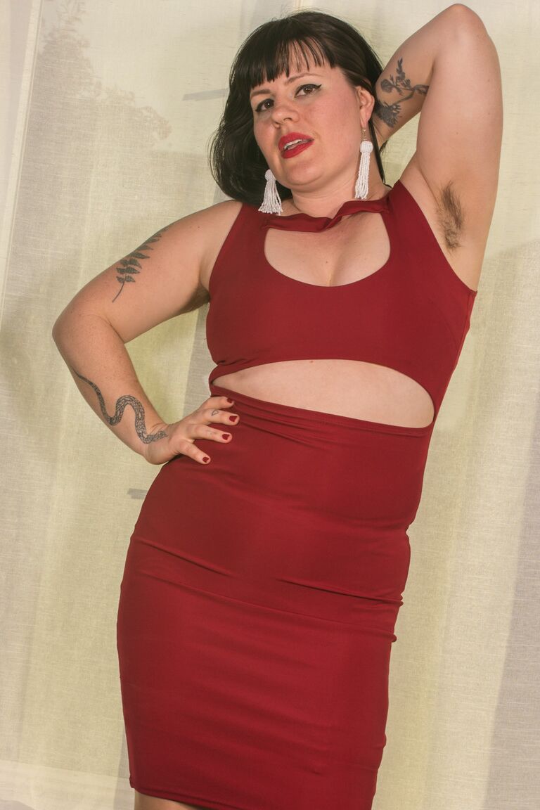 21P Arousing mature with a huge ass Olivia Rose undresses and poses in lingerie