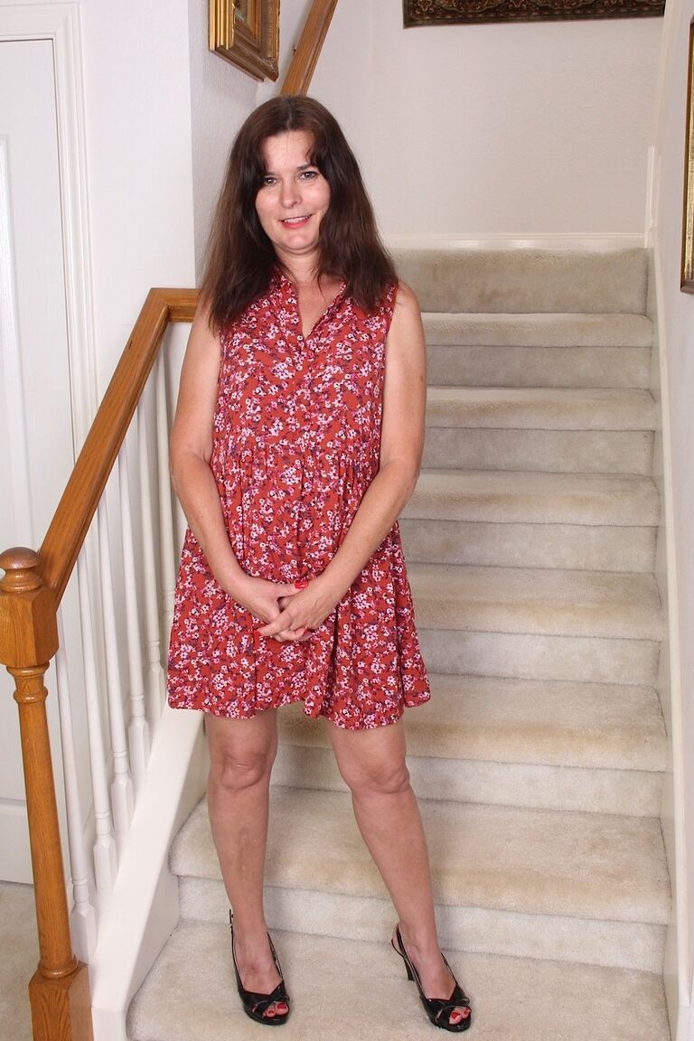 18P Mature Bridget Calling comes down and stops on the stairs to masturbate